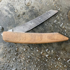 Taschen/Steakmesser Damast,
Walnuss Griff